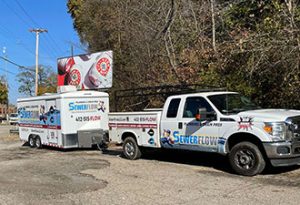 Sewer Flow truck pulling Sewer Flow trailer