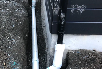 underground downspout damage repair and maintenance